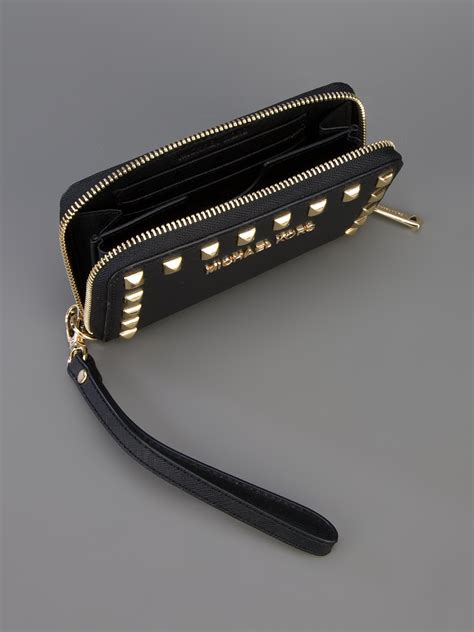 michael kors wristlet black and gold|Michael Kors black wallet women's.